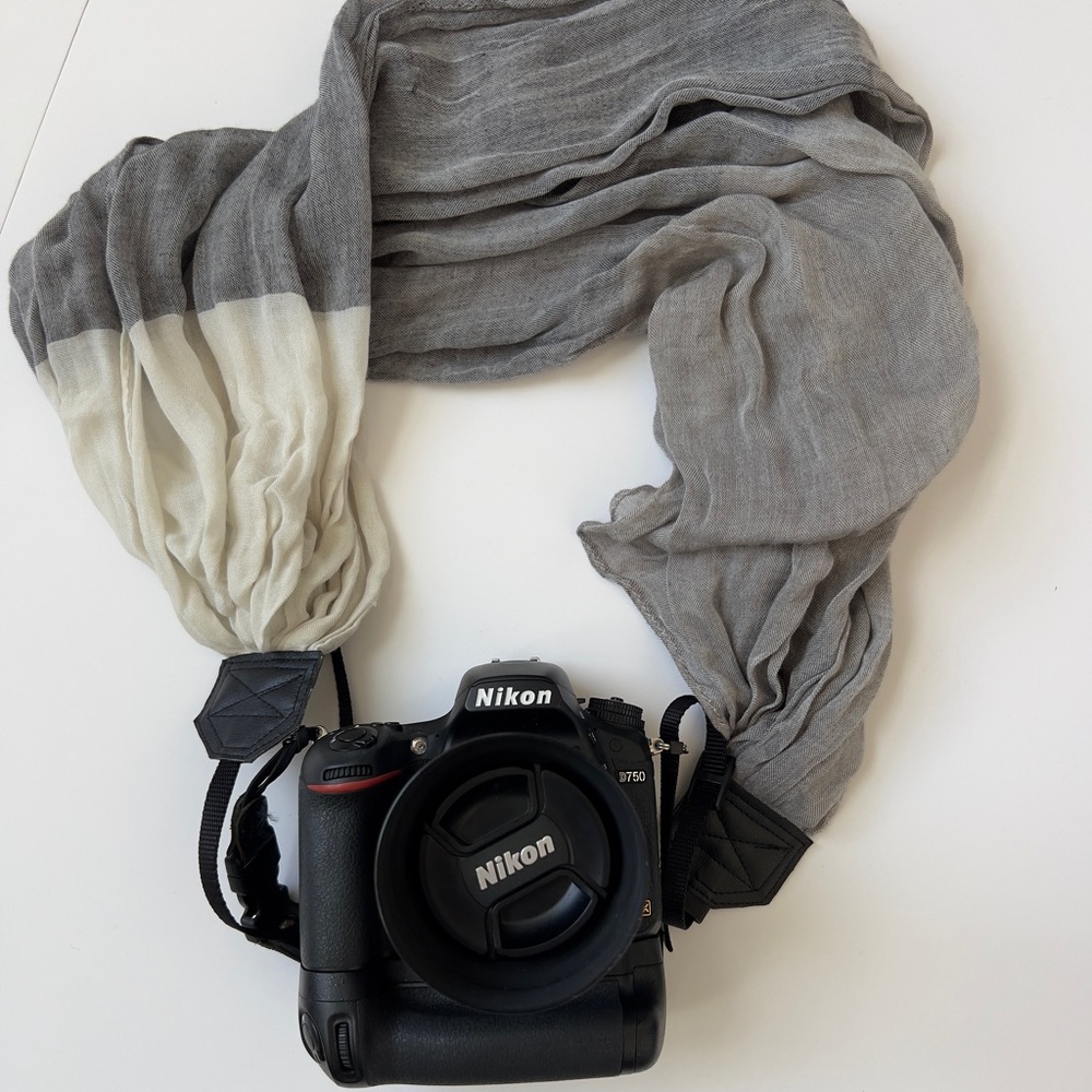 Gray and White camera strap